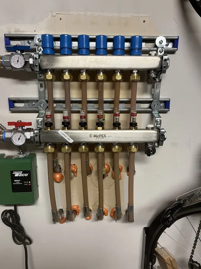 Plumber performing Water Heater Repair at a residential property in Lexington